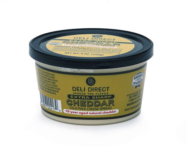 A container of deli direct extra sharp cheddar cheese.