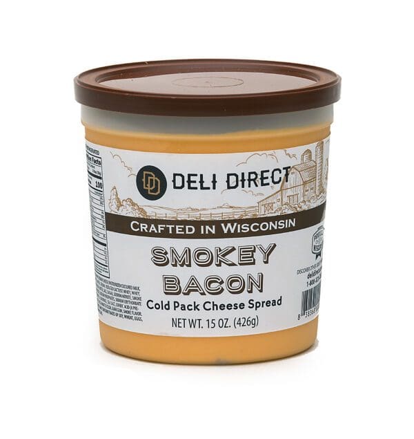 A container of deli direct smokey bacon cheese spread.