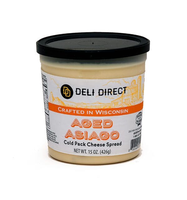 A container of cheese spread is shown.