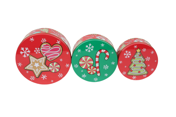 Three round boxes with christmas designs on them.