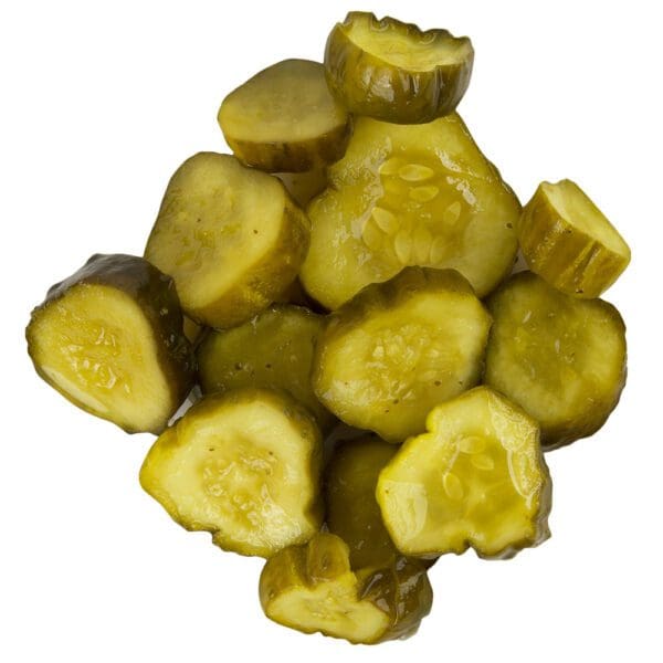 A pile of pickles sitting on top of each other.